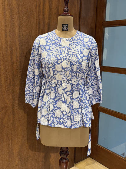 Blue floral block print cotton peplum top with tie waist and 3/4 sleeves