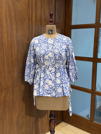 Blue and white floral cotton top with peplum silhouette and elastic sleeves